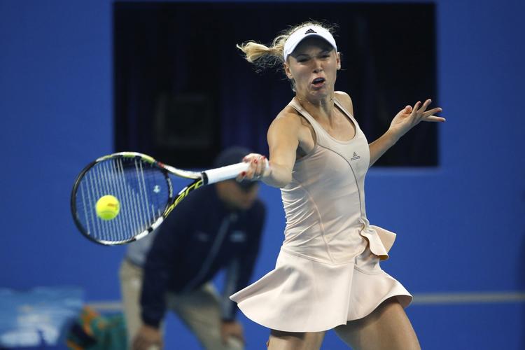 'Fri'. Mens flere rivaler har spillet kampe de sneste fem dage, så har Wozniacki trænet. Bl.a. løbetrænet som led i hendes forberedelser til sin maratondebut i New York i november. 