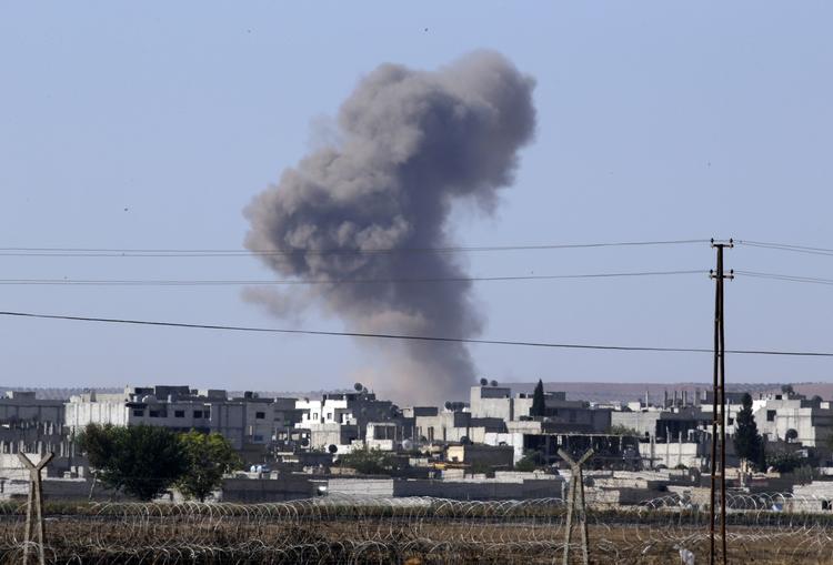 kamp. Endnu et luftangreb mod IS fra en amerikansk-ledet koalition i Syrien i dag i Kobane. 