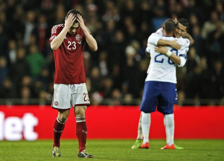 NEDTUR. Langt inde i overtiden blev Danmark pandet ned af Cristiano Ronaldo. 