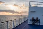 Stemning. Her går solen ned over den sidste afgang på ruten Esbjerg-Harwich. Rederiet DFDS håber at lokke nogle af de rejsende over på ruten til Litauen. 