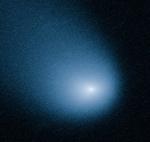 Komet. Billeder fra Nasa viser kometen Siding Spring på sin færd gennem rummet. 