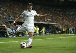 mave-muskel. Gareth Bale er tvivlsom til både Real Madrids kamp mod Liverpool og ærkefjendeopgøret mod FC Barcelona. 