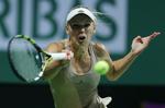 kraftcenter. Caroline Wozniacki samlede det meste op og holdt en lav fejlprocent i kampen mod Maria Sharapovas powertennis. 