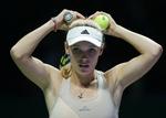 suveræn. Caroline Wozniacki vinder sin pulje ved sæsonfinalen i Singapore og er i semifinalen efter en stor præstation i alle tre puljekampe. 