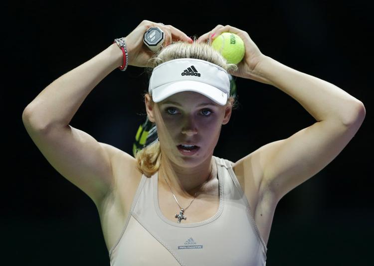 suveræn. Caroline Wozniacki vinder sin pulje ved sæsonfinalen i Singapore og er i semifinalen efter en stor præstation i alle tre puljekampe. 