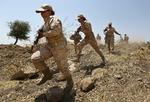 kampberedt. Et større antal kvinder deltager i kampen mod Islamisk Stat. Billedet er fra 3. juli, hvor en eliteenhed af kvindelige, kurdiske soldater træner i Sulaimaniyah 260 kilometer nordøst for Bagdad i Irak. 