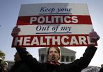 Amy Brighton fra Ohio var på gaden tidligere i år i protest mod republikanernes ændringer af Obamacare. Nu ser et kompromis-forslag ud til at komme forbi første store hurdle. 