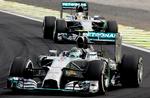 tæt. Mercedes-kører Nico Rosberg holdt sin teamkollega Lewis Hamilton bag sig og sikrede dermed spændingen til sidste meter i årets formel 1-serie. Foto: Andre Penner/AP 