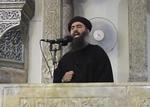Leder. Billedet af Abu Bakr al-Baghdadi i en moske i Irak er taget fra en video, som Islamisk Stat har lagt online i juli i år. Videoen er muligvis den eneste offentlige optræden af den mytiske leder. AP har verificeret indholdet. 
