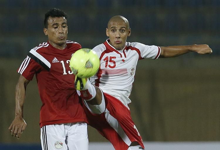 aflysning? Tunesien og Egypten under afvikling af landenes indbyrdes kvalifikationskamp forud for Africa Cup of Nations, som nu er i fare. 