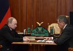 rapport. Den russiske forsvarsminister Sergej Shoigu (th) briefter sin præsident, Vladimir Putin, under et møde i sommers. 