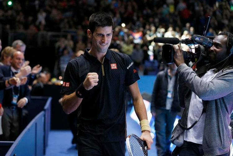titeltække. Novak Djokovic havde en enkelt nedtur undervejs mod sejren over Kei Nishikori lørdag i London, men han ligner en favorit til at tage den tredje gevinst på stribe i sæsonafslutningen. Foto: Kirsty Wigglesworth/AP 