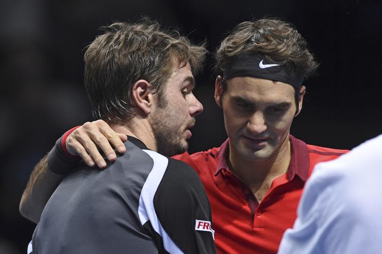 knaster.  Stan Wawrinka (tv) var sur på Roger Federers kone efter nederlaget til landsmanden ved sæsonfinalen. 