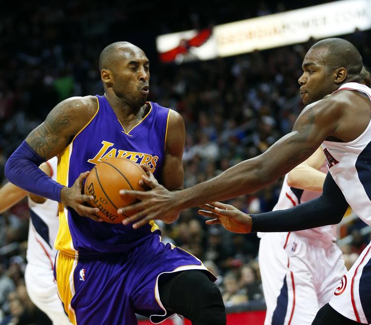 32.000. Los Angeles Lakers' guard, Kobe Bryant, satte en milepæl på vejen mod en sjælden sejr til Lakers. 