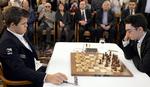 vidunderbørn. Magnus Carlsen (tv) ved en turnering i februar i år i Zürich, hvor han spillede mod italienske Fabiano Caruana (th). 