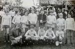 1972. Fire af spillerne fra Brøndbys lilleputhold, der i 1972 tabte finalen i Brøndby Cuppen til Hvidovre, endte med at få kampe på klubbens førstehold: John Widell (nr. 3 bagest fra højre), Jan Nyström (nr. 2 bagest fra venstre), målmanden Ole Nørrevang og den senere landsholdsspiller Erik Rasmussen (nr. tre forrest fra venstre). Allan Nielsen (nr. 3 fra bagest venstre) måtte senere 'nøjes' med at skrive i Politiken om sine tidligere medspillere. Bygningen i baggrunden er træhuset, der var kendt som Tulles klubhus. 
