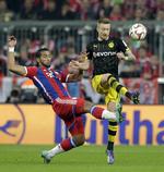 Klubskifte? 25-årige Marco Reus (th) er i gang med sin tredje sæson i Dortmund. Han har spillet 23 landskampe for Tyskland og havde været verdenemster, hvis ikke en skade umiddelbart før VM satte en stopper for hans deltagelse i Brasilien. 