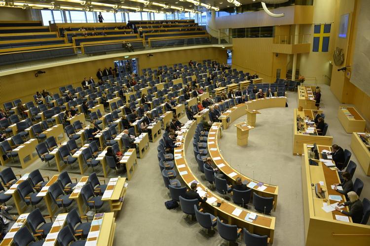 Det var forventet, at den borgerlige opposition samlet i Alliansen og partiet Sverigedemokraterna ville stemme imod forslaget, der netop har været til afstemning i den svenske Riksdag, der her ses. 