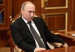 Populær. Putins popularitet blandt russerne bygger delvis på, at han sikrer velstand og stabilitet og ikke mindst holder prisen på vodka i ro. 