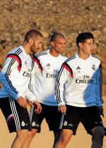 favoritter. Real Madrid-spillerne Karim Benzema, Pepe og så en af Sydamerikas bedste spillere, James Rodríguez fra Colombia (th.), forberedte sig fredag på at gøre det svært for San Lorenzo i aftenens finale, der bliver spillet på Grand Stade i Marrakech. 