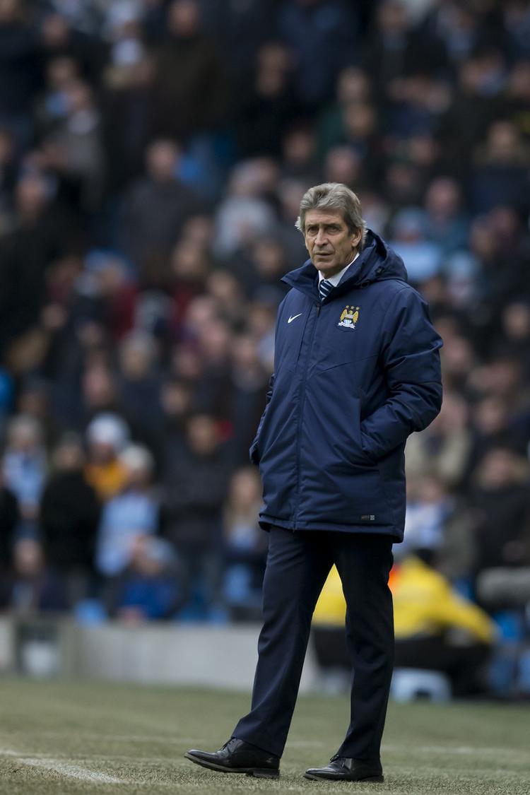 Iagttagelser. Manuel Pellegrini ser en kende anstrengt ud her, men efterfølgende gav han masser af roser til sine spillere. Jon Super/AP 