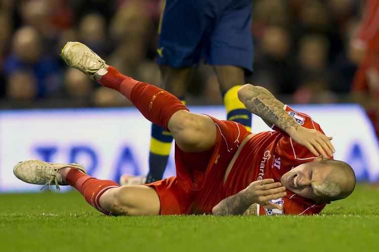 HOVEDPERSON. Efter at være blevet trådt i hovedet blev Martin Skrtel lappet sammen og sikrede Liverpool et point mod Arsenal. 