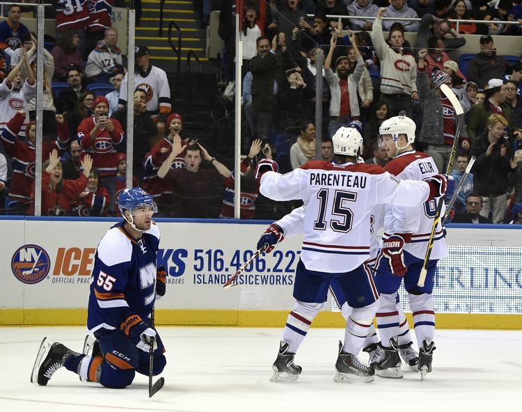 Montreal Canadiens P.A. Parenteau (15), Lars Eller (81) og David Desharnais fejrer en scoring af Desharnais. 