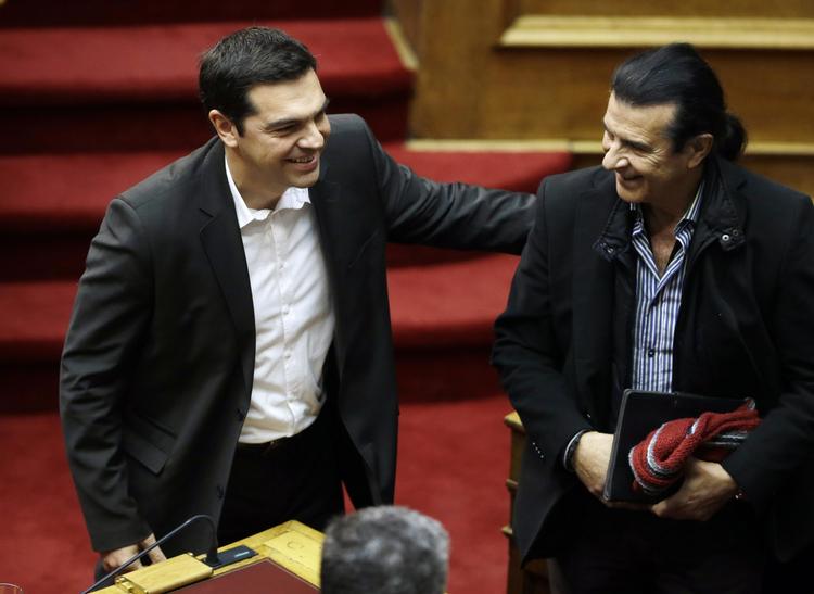 magtskifte. Syriza-lederen Alexis Tsipras (tv.) - fotograferet i parlamentet i går - kan blive ny regeringsleder i Grækenland, hvis meningsmålingerne holder frem  til valget i januar. 