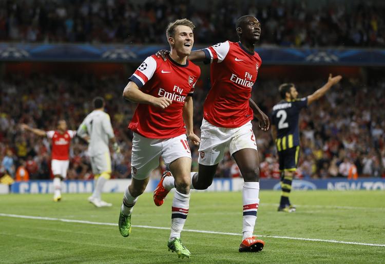 skifte. Yaya Sanogo (th) har ikke fået den ventede succes i Arsenals trøje, så et skifte virker sandsynligt. 