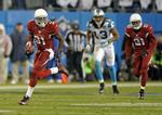 Arizona Cardinals' Antonio Cromartie i et rush frem ad banen mod Carolina Panthers. 