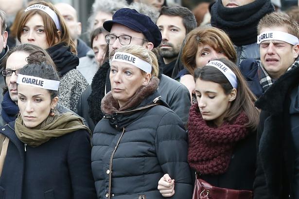 Medarbejdere fra Charlie Hebdo gik med i fredsmarchen. 