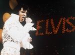 vigør. Elvis på scenen i begyndelsen af 1970’erne. En udstilling i London viser et stort antal Elvis-genstande, der aldrig før har været uden for USA. 