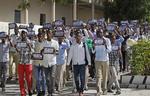 Demo. I Somalias hovedstad Mogadishu er universitetsstuderende gået på gaden i protest mod Charlie Hebdos nye tegning af profeten Muhammed, som de opfatter som et angreb på deres religion. »Jeg er muslim, og jeg elsker min profet«, står der på skiltene. 