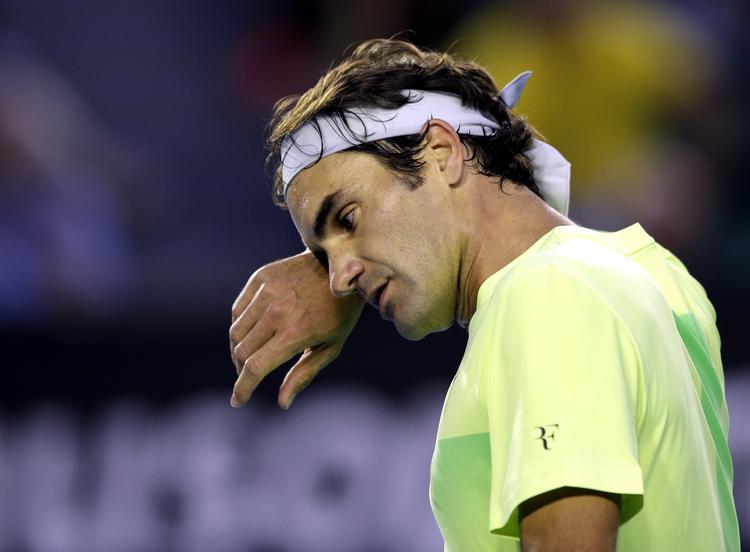suveræn. Roger Federer fik trods alt sved på panden, men schweizeren havde ikke store problemer med at sende Lu Yen-Hsun ud af Australian Open. 