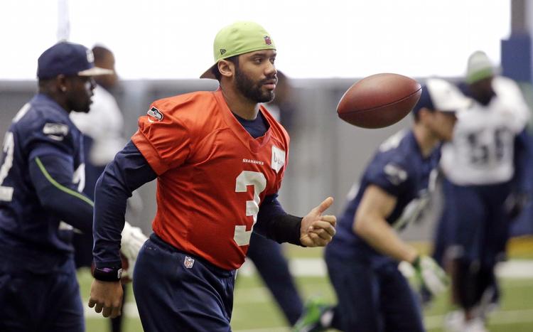fordel? Seattle Seahawks quarterback Russell Wilson under træningen forud for årets Super Bowl 1. februar. 