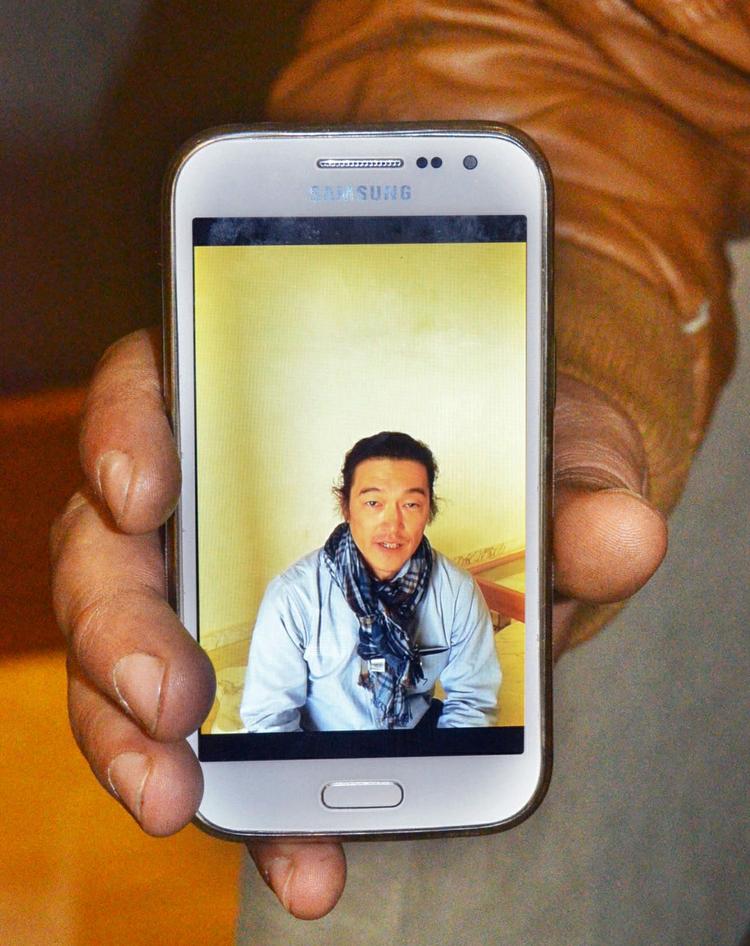 Syrien. Den 47-årige japaner Kenji Goto på et foto taget få timer før, han blev taget som gidsel af Islamisk Stat. 