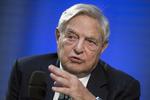 ulige. George Soros mener, at den økonomiske hjælpepakke, som Den Europæiske Centralbank vedtog i går, gavner dem, der har formuer og ejer obligationer, fordi de bliver mere værd. 