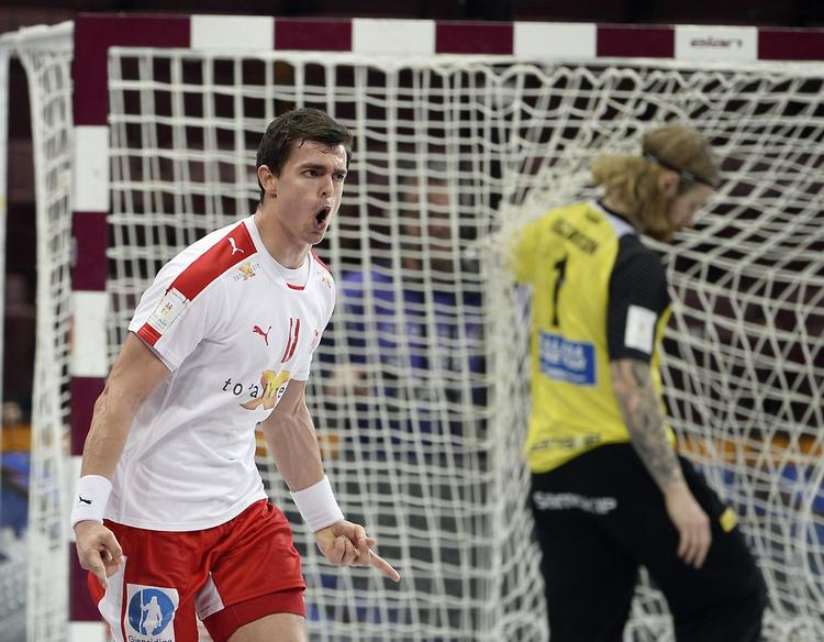 TOPSCORER. Med tre mål i hver halvleg blev Rasmus Lauge dansk topscorer mod Island. 