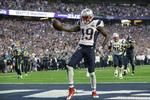 New England Patriots Brandon LaFell har grebet den ovale bold og jubler over et touchdown. 