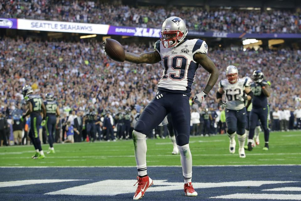 New England Patriots Brandon LaFell har grebet den ovale bold og jubler over et touchdown. 