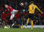 Omkamp. Wayne Rooney og de øvrige United-stjerner måtte igennem en ekstra kamp for at gå videre i pokalturneringen. 