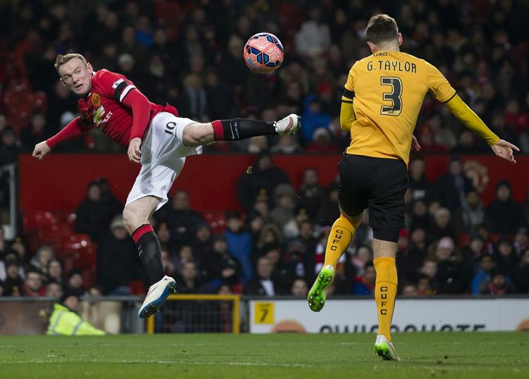 Omkamp. Wayne Rooney og de øvrige United-stjerner måtte igennem en ekstra kamp for at gå videre i pokalturneringen. 