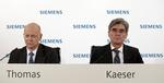 Spareplan. Siemens med direktør Joe Kaeser (t.h.) i spidsen nedlægger et stort antal stillinger. 