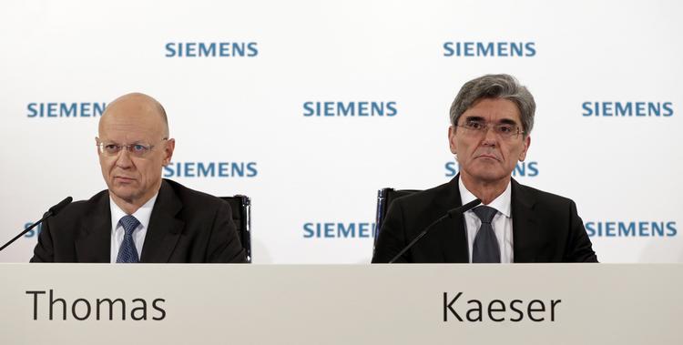 Spareplan. Siemens med direktør Joe Kaeser (t.h.) i spidsen nedlægger et stort antal stillinger. 