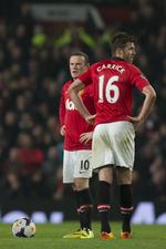 Balencespiller. Michael Carrick har spillet over 350 kampe på Manchester Uniteds centrale midtbane, men i takt med at han er blevet 33 år, så er skaderne også blevet mere hyppige hos omdrejningspunktet. Da United mødte Burnley i sdiste uge, var Wayne Rooney (bagerst) den mest defensitorienterede midtbanespiler – og Rooney er jo som bekendt angriber. 