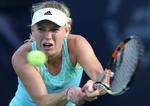 VINDER. Caroline Wozniacki er fremme i kvartfinalen i Dubai efter en sikker sejr over Alizé Cornet. 