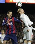 Hård. Sergio Busquets (tv) har spillet 314 kampe for FC Barcelona. Det kan blive til en del flere frem til 2019. 