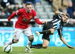 AFGØRELSEN. En energisk solotur  af Wayne Rooney (tv.) var optakten, inden Ashley Young blev matchvinder for Manchester United. 