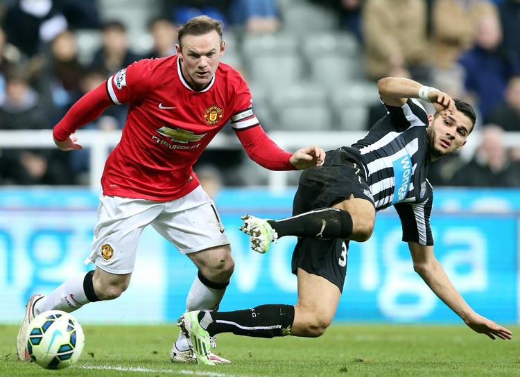 AFGØRELSEN. En energisk solotur  af Wayne Rooney (tv.) var optakten, inden Ashley Young blev matchvinder for Manchester United. 