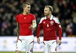 Arbejdskamp. Anfører Daniel Agger (tv) og Lars Jacobsen er stærkt utilfredse med DBU's ageren i lønstriden. 